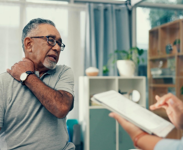 Senior patient for consultation with shoulder pain