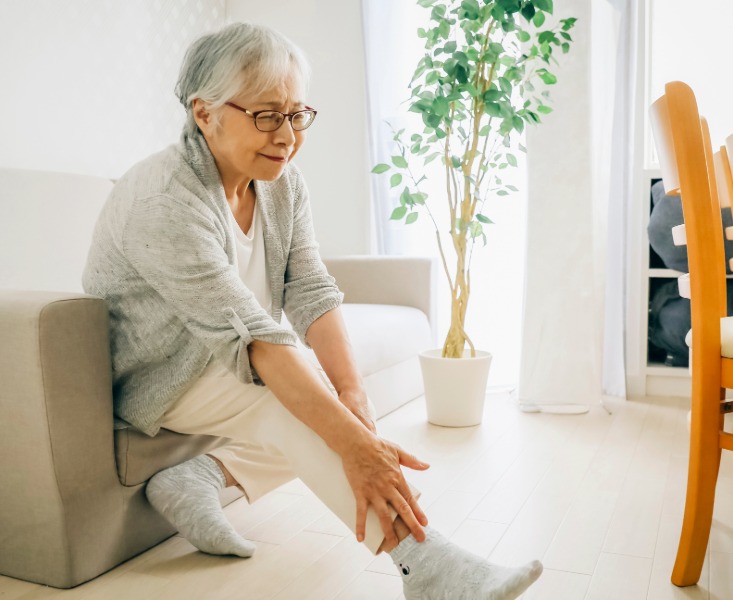 Elderly woman with ankle pain